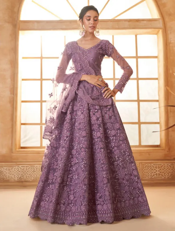 Purple Net Full Embroidered Wedding Wear Lehenga