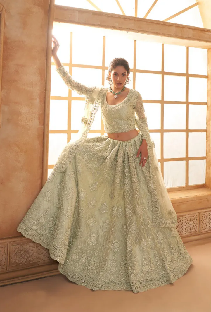 Mint Green Net Full Embroidered Wedding Wear Lehenga - Image 2