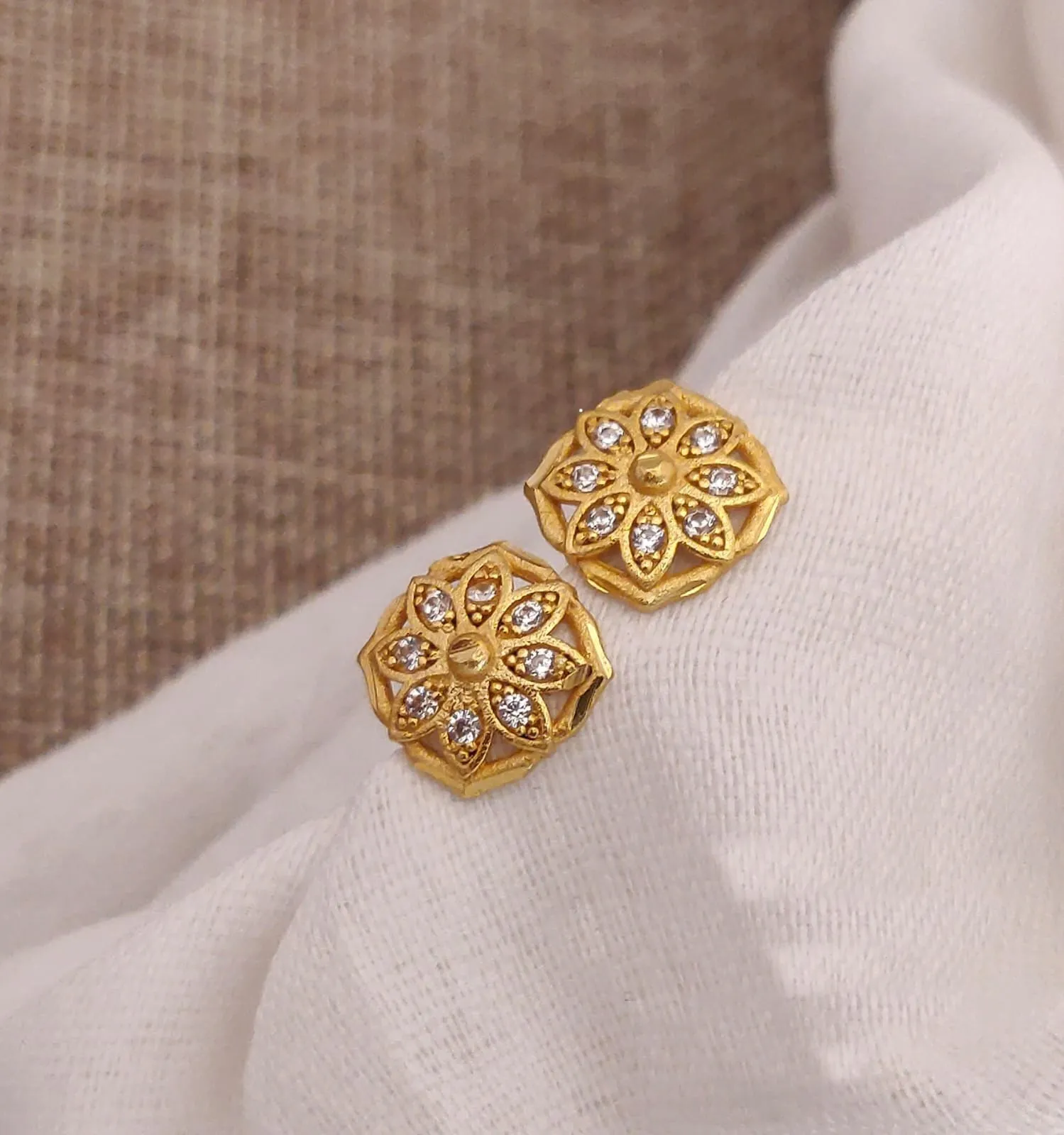 Gold Toned Floral Stud Earrings