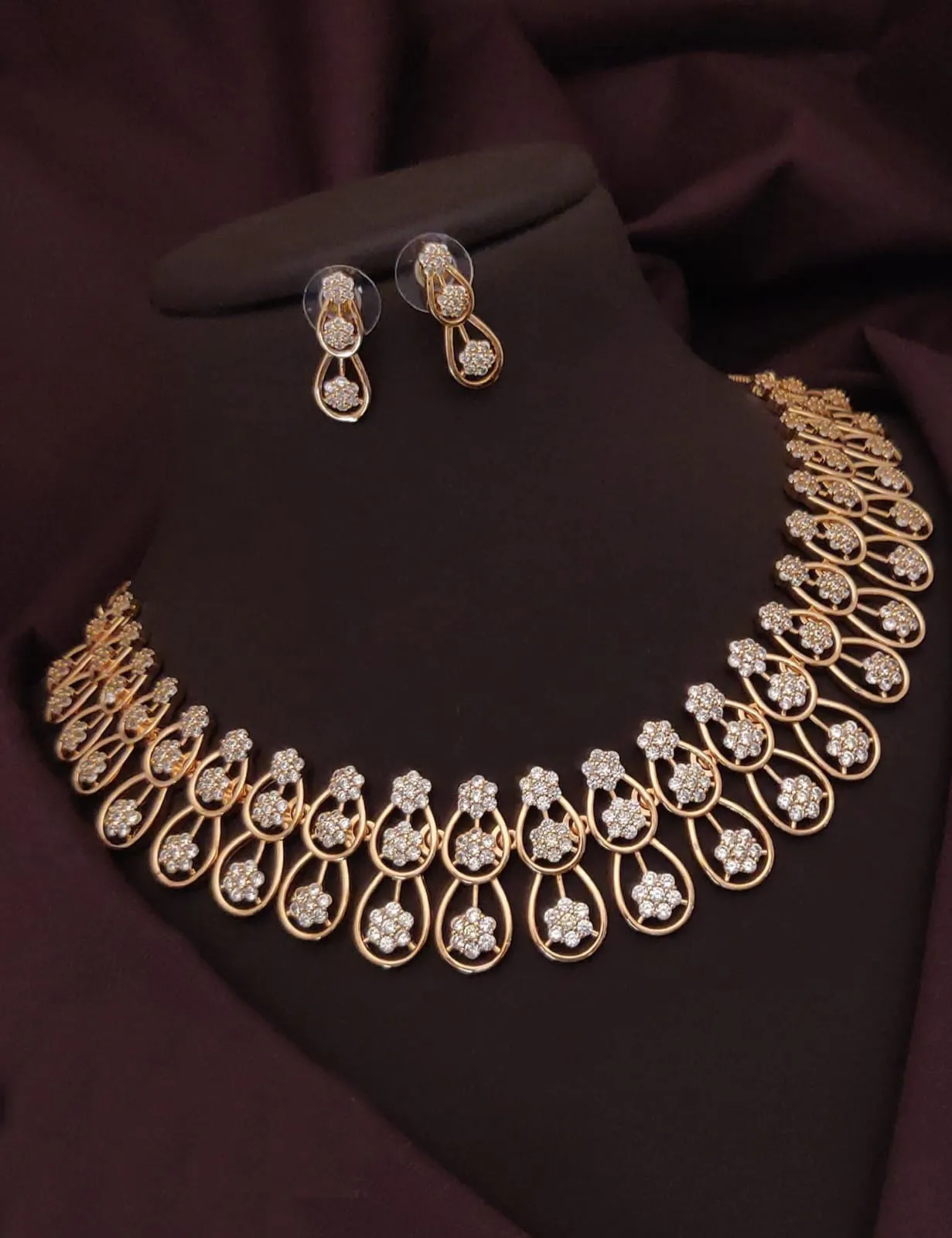 Gold-Toned Floral Teardrop Necklace Set with Flower Studs
