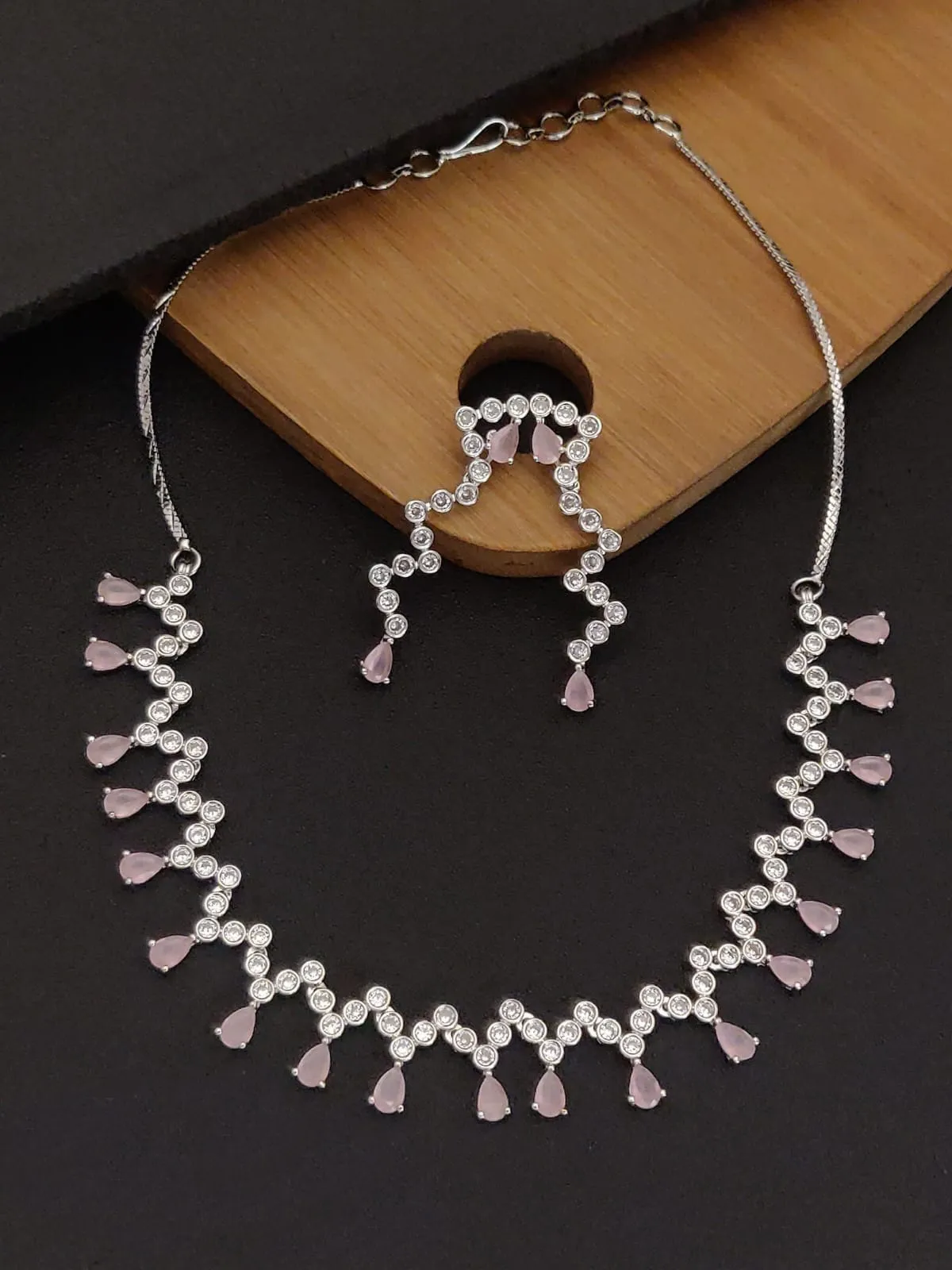 Elegant Silver-Plated American Diamond Necklace Set with Long Drop Earrings.