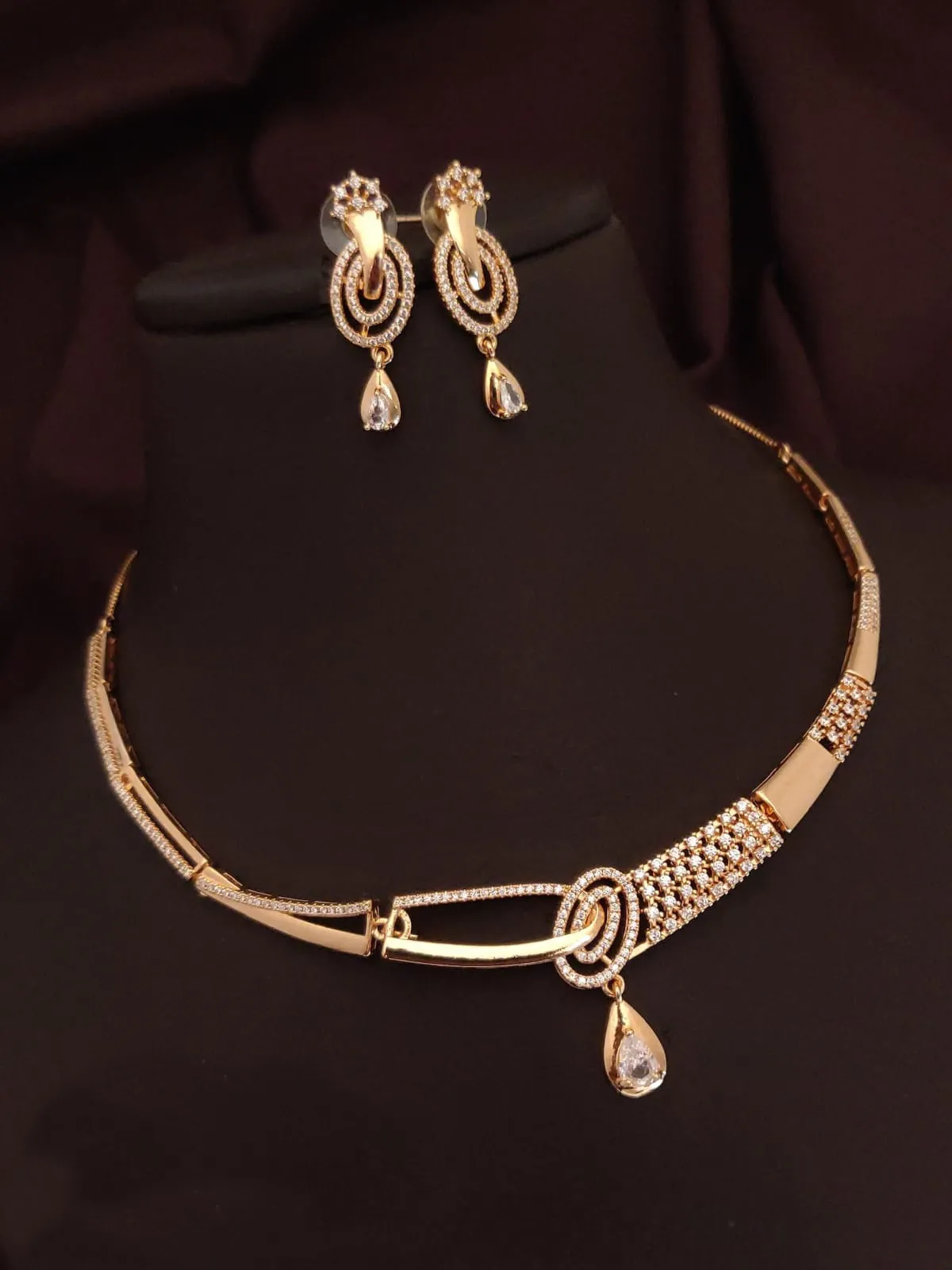 Gold-Plated Interlocking Loop Necklace with Crystal Earrings