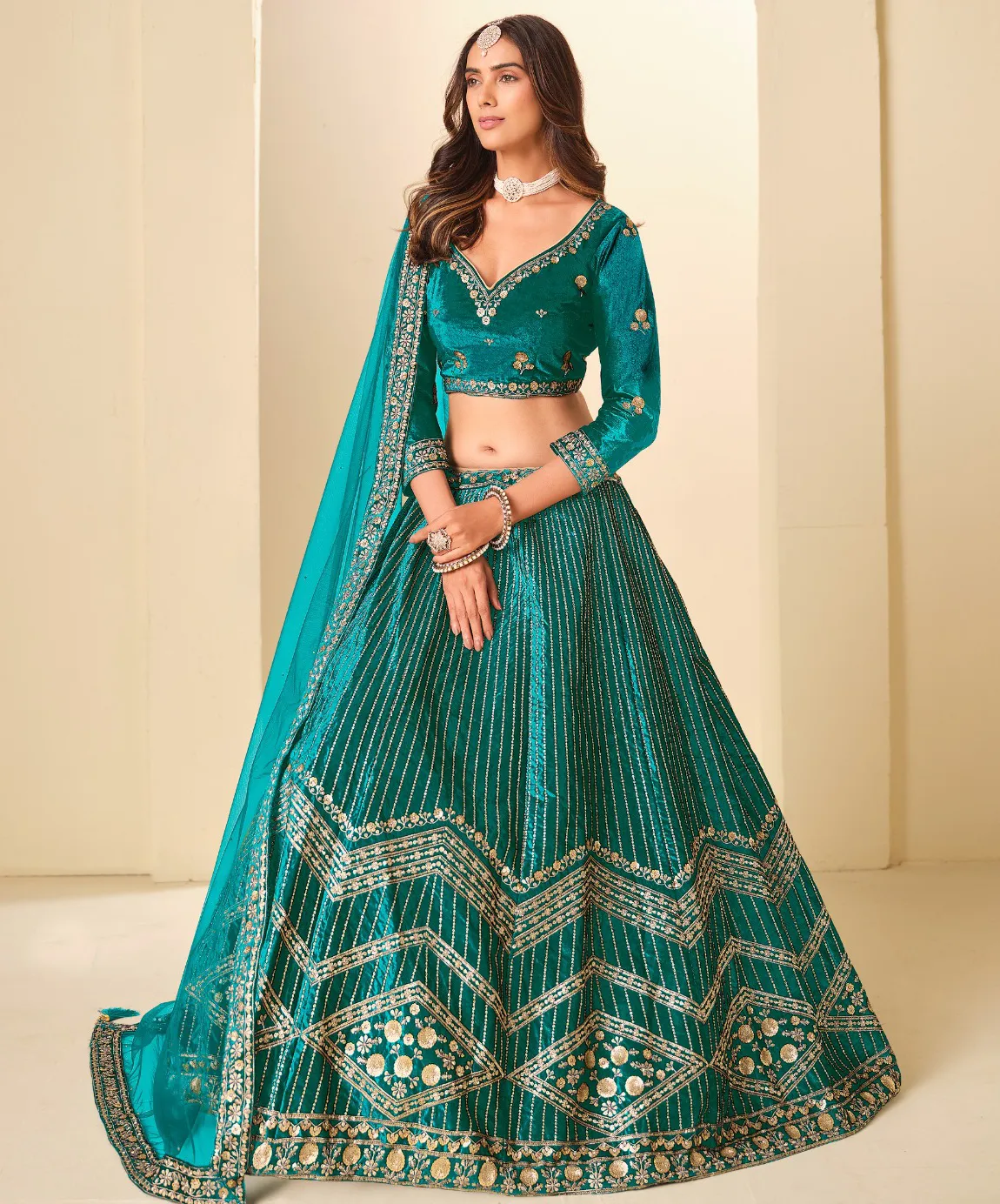 Teal Green Velvet Golden Embroidered Party Wear Lehenga