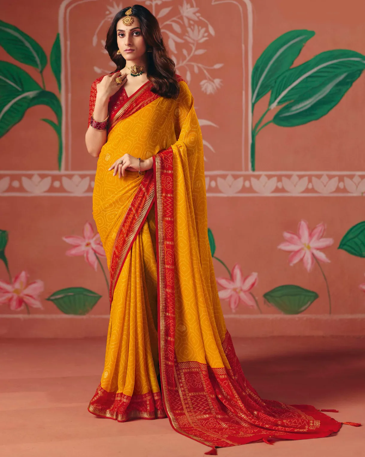 Mustard Bember Georgette Bandhani Style Saree With Tassels