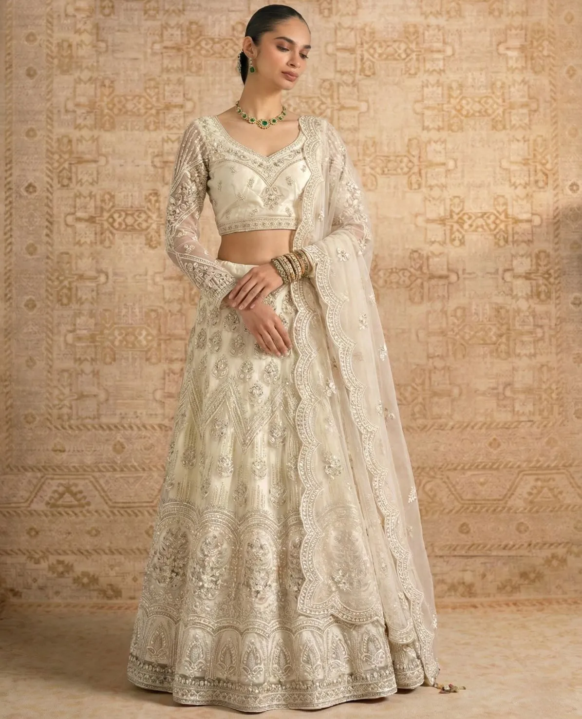 Off White Butterfly Net Heavy Embroidered Lehenga Choli