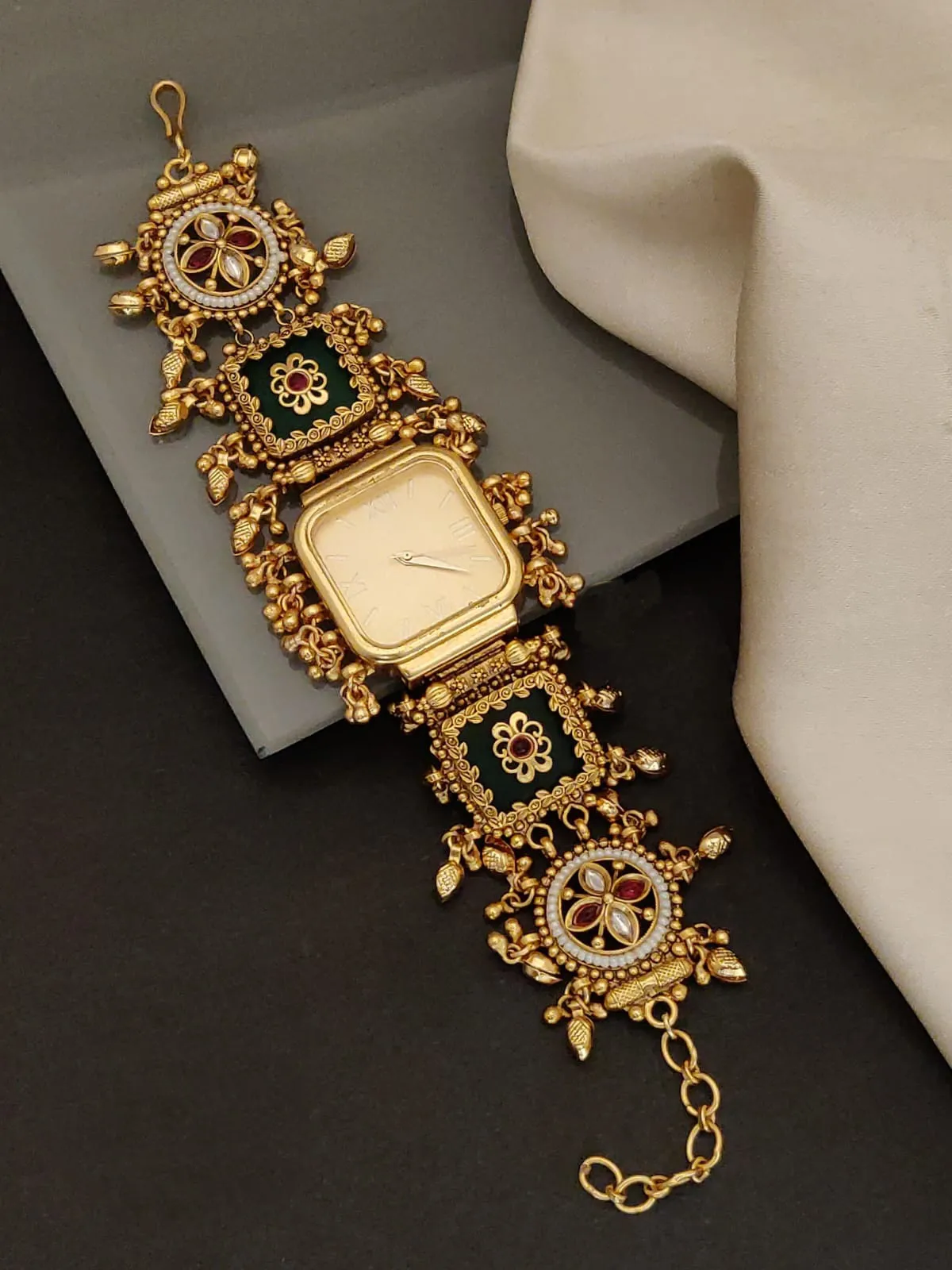 Antique Gold Ethnic Bracelet Watch With Green Enamel Work