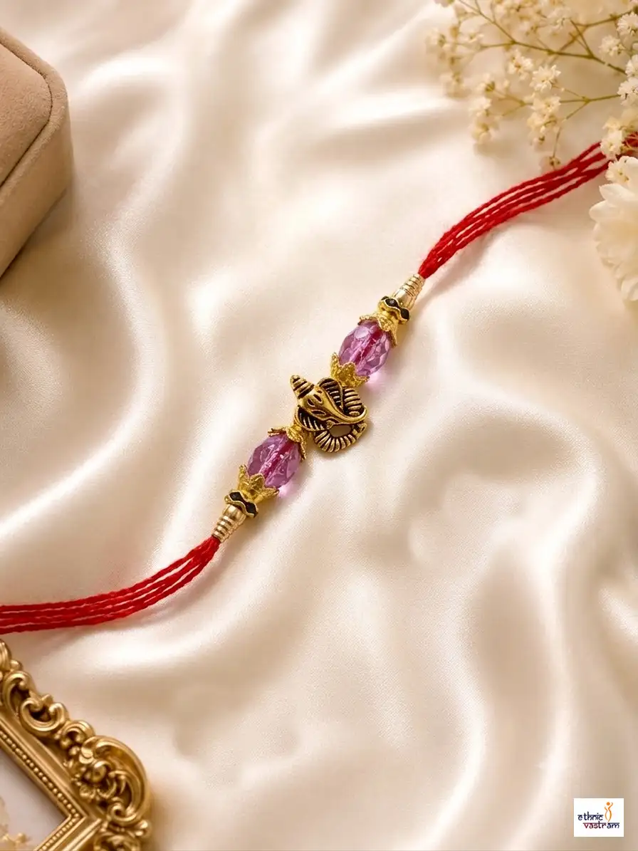 Handcrafted Purple Crystal Ganesha Rakhi with Red Thread