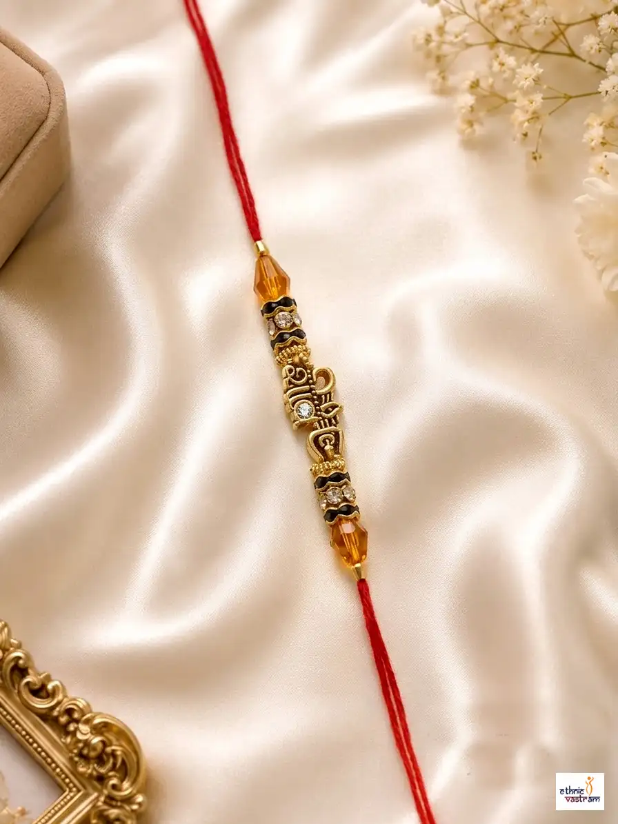 Handcrafted Sacred Om Amber Crystal Red Thread Rakhi